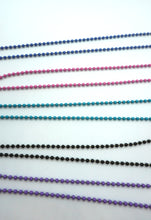Load image into Gallery viewer, Blue core with orange and purple encased in clear glass bead on ball chain