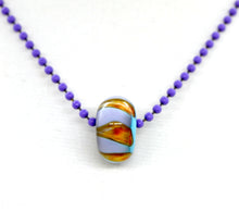 Load image into Gallery viewer, Blue core with orange and purple encased in clear glass bead on ball chain