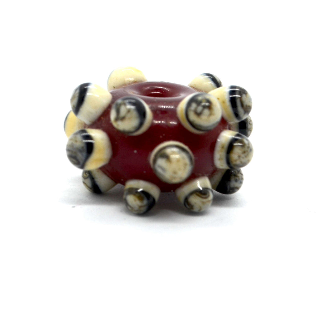 Red glass bead with Raised Dots in Ivory and Black