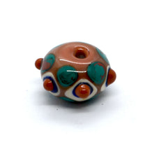 Load image into Gallery viewer, Single lampwork glass bead in blush with dots