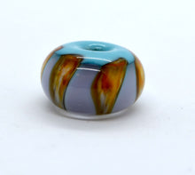 Load image into Gallery viewer, Blue core with orange and purple encased in clear glass bead on ball chain