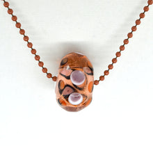 Load image into Gallery viewer, Lampwork glass bead on ball chain in black, white, purple and transparent salmon.
