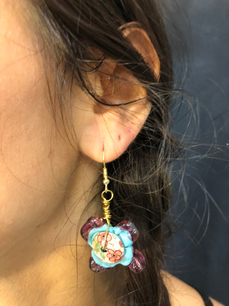 Floral tin with pink glass bead earrings