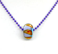 Load image into Gallery viewer, Blue core with orange and purple encased in clear glass bead on ball chain

