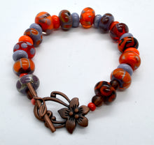 Load image into Gallery viewer, Vibrancy in orange and purple -Lampwork Glass Bead Bracelet
